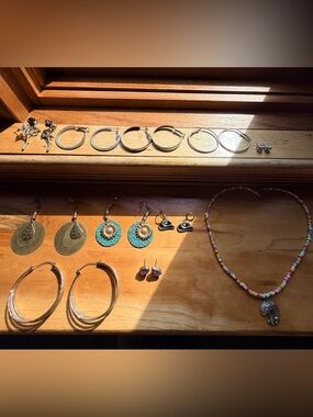 10 Pairs of Earrings and a Necklace